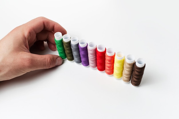 hands holding embroidered cloth